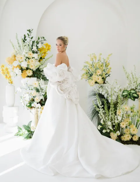 Butter Yellow online feature hero with a white bridal gown and butter-yellow floral styling
